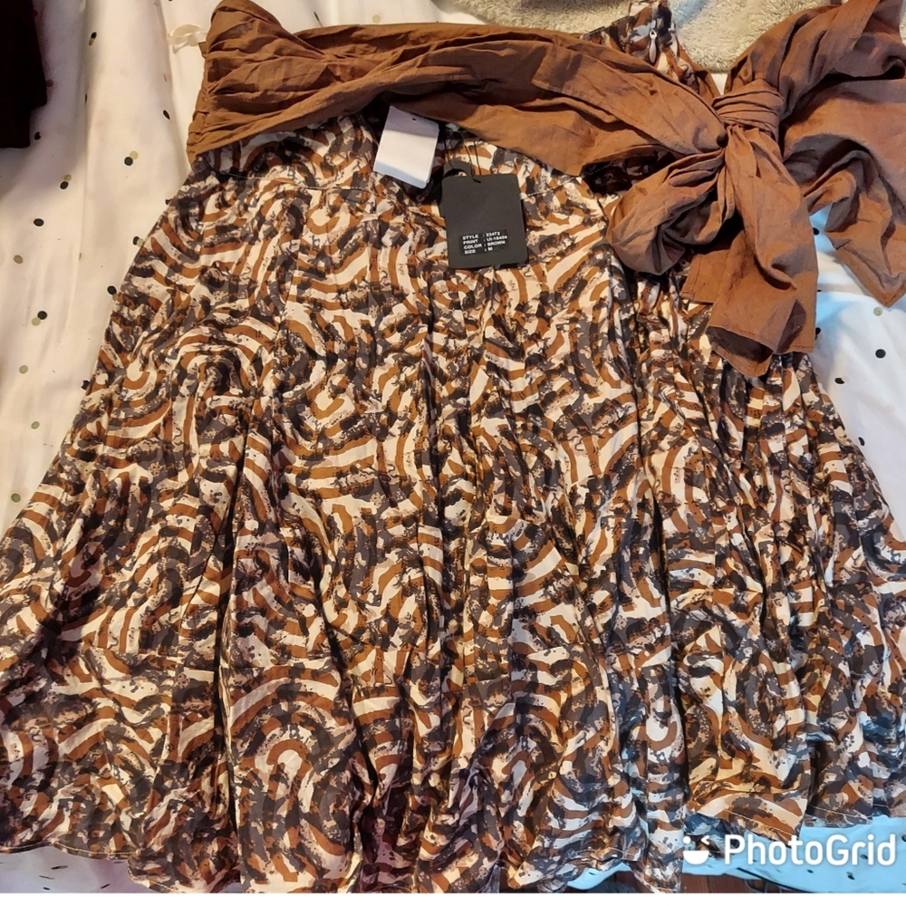 Brown, black and white skirt with a bow, size M